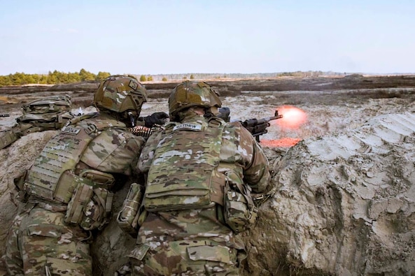 Soldiers engage targets and provide security during a combined arms live fire exercise in Nowa Deba, Poland, March 17. The focus of the 82nd Airborne Division's mission while deployed to Poland