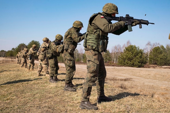 Polish soldiers assigned to the 18th Mechanized Division engage targets during a combined live-fire training event in Nowa Deba, Poland, March 15.