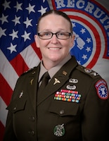 Woman standing in front of flags