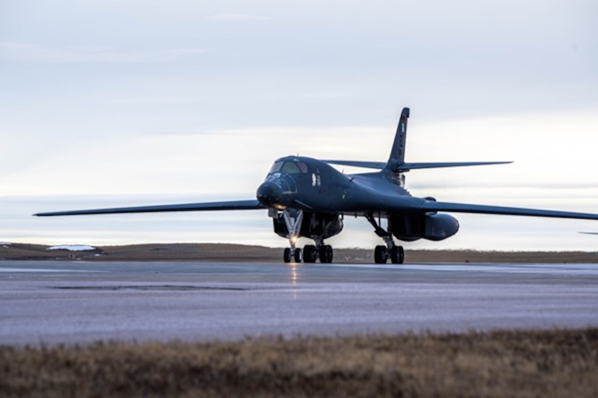 A U.S. Air Force B-1B Lancer, assigned to the 37th Bomb Squadron, taxis at Ellsworth Air Force Base, South Dakota, after completing a long-duration CONUS-to-CONUS (C2C) mission to the Indo-Pacific Jan. 10, 2023. .C2C missions contribute to joint force lethality and deter aggression in the Indo-Pacific by demonstrating USAF ability to operate anywhere in the world at any time in support of the National Defense Strategy. (U.S. Air Force photo by A1C Josephine Pepin)