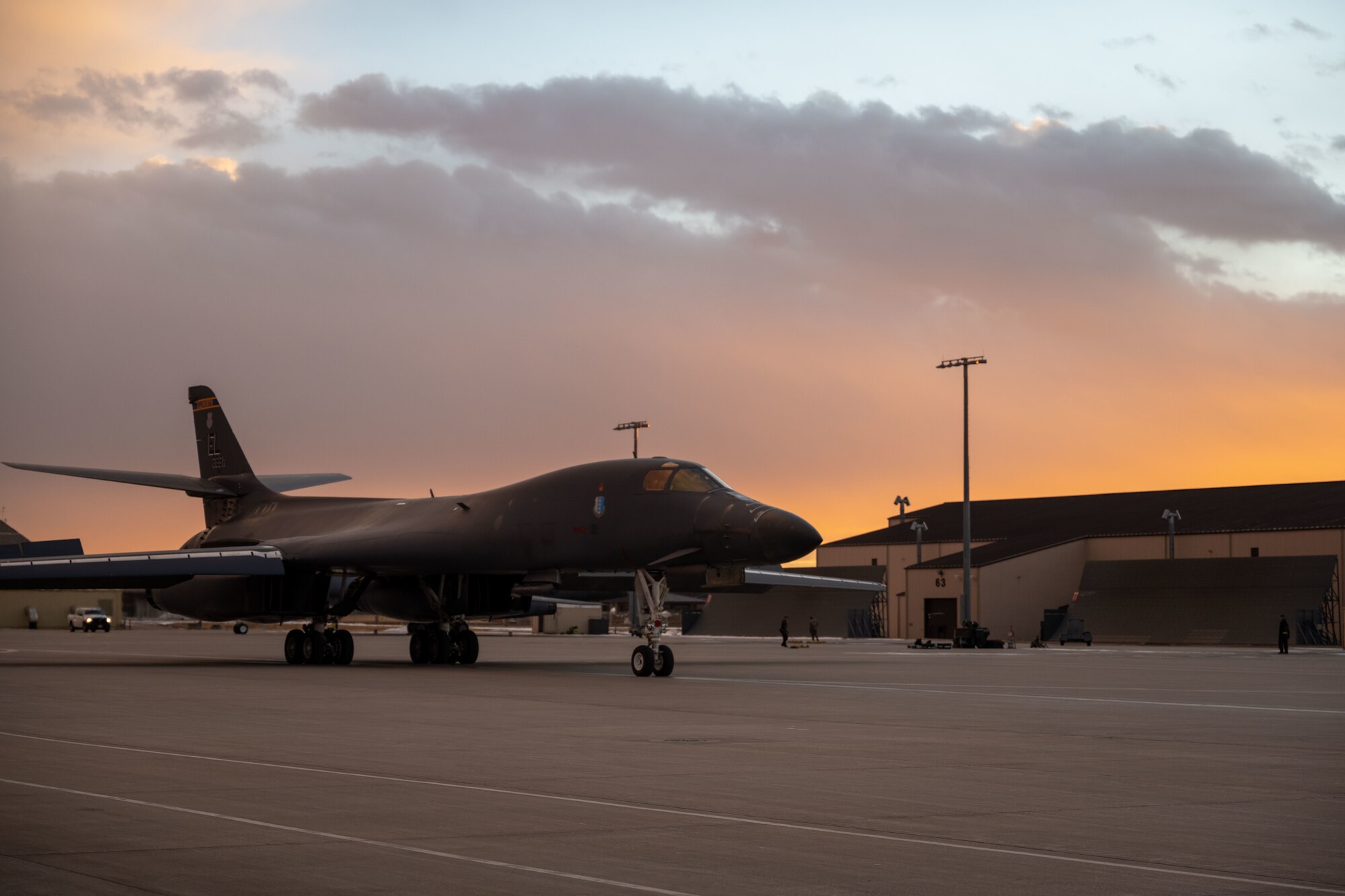 A B-1B Lancer taxis down the flightline in preparation for a CONUS-to-CONUS (C2C) mission at
Ellsworth Air Force Base, South Dakota, Jan. 9, 2022. Training outside the U.S. enables aircrew
and Airmen to become familiar with other theaters and airspace and enhances the enduring
skills necessary to confront a broad range of global challenges. (U.S. Air Force photo by Airman
1st Class Adam Olson)