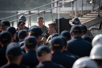 Adm. Samuel Paparo (center), commander, U.S. Pacific Fleet, met with Sailors from USS Michael Murphy (DDG 112), currently undergoing a maintenance availability in Dry Dock #4 of Pearl Harbor Naval Shipyard and Intermediate Maintenance Facility, Jan. 10, 2023. (Official U.S. Navy photo by Dave Amodo)