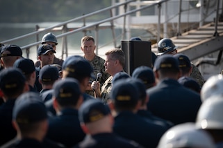 Adm. Samuel Paparo (center), commander, U.S. Pacific Fleet, met with Sailors from USS Michael Murphy (DDG 112), currently undergoing a maintenance availability in Dry Dock #4 of Pearl Harbor Naval Shipyard and Intermediate Maintenance Facility, Jan. 10, 2023. (Official U.S. Navy photo by Dave Amodo)
