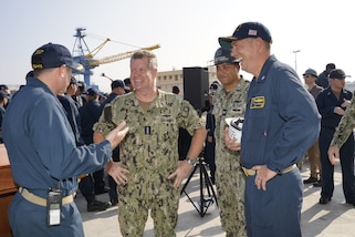 Adm. Samuel Paparo (center), commander, U.S. Pacific Fleet, meets with Cmdr. Jonathan B. Greenwald (left), executive officer, USS Michael Murphy (DDG 112) and Cmdr. John Holthaus (right), commanding officer, USS Michael Murphy (DDG 112), currently undergoing a maintenance availability in Dry Dock #4 of Pearl Harbor Naval Shipyard and Intermediate Maintenance Facility, Jan. 10, 2023. (Official U.S. Navy photo by Marc Ayalin)