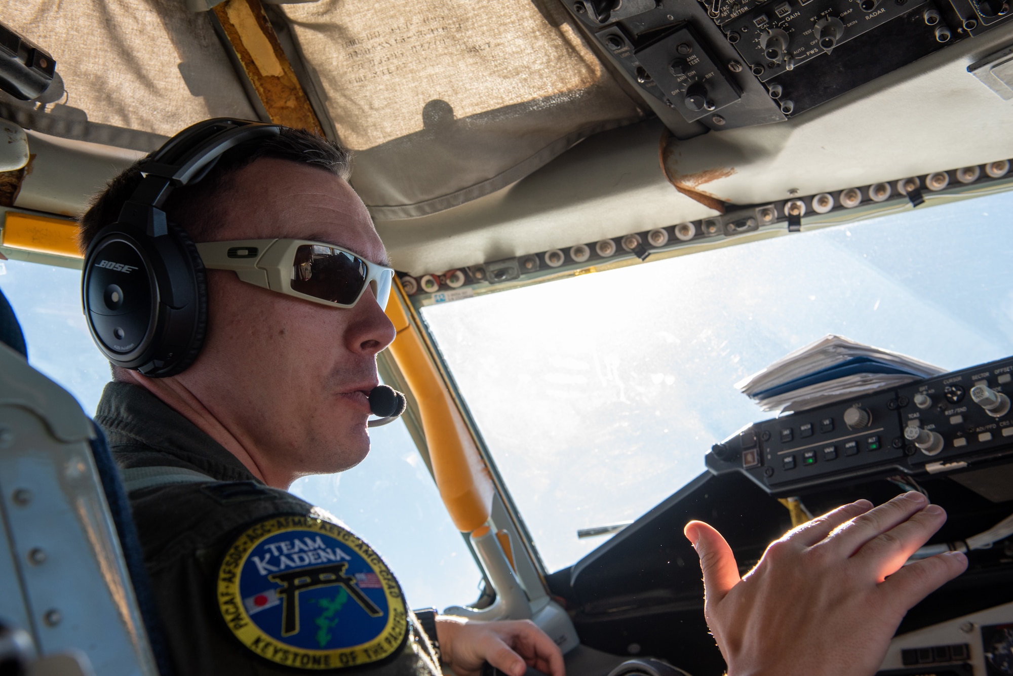 Pilot sits inside of the cockpit