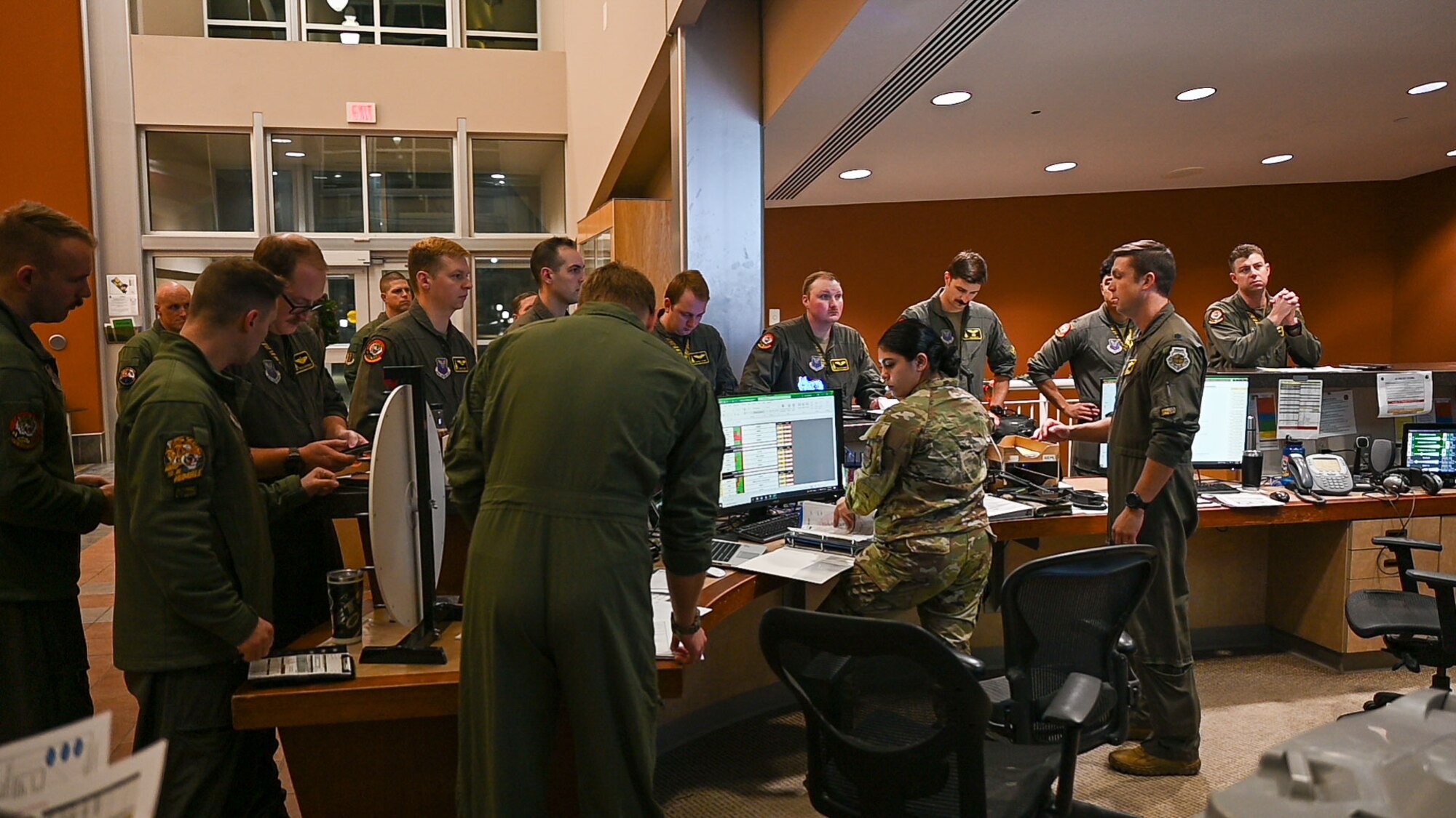 Aircrew from the 37th Bomb Squadron analyze flight information for a CONUS-to-CONUS (C2C) mission to the Indo-Pacific region at Ellsworth Air Force Base, South Dakota, Jan. 9, 2023. C2C missions send pilots out to execute airborne exercise maneuvers anywhere in the world before landing back inside the United States. (U.S. Air Force photo by Airman 1st Class Adam Olson)