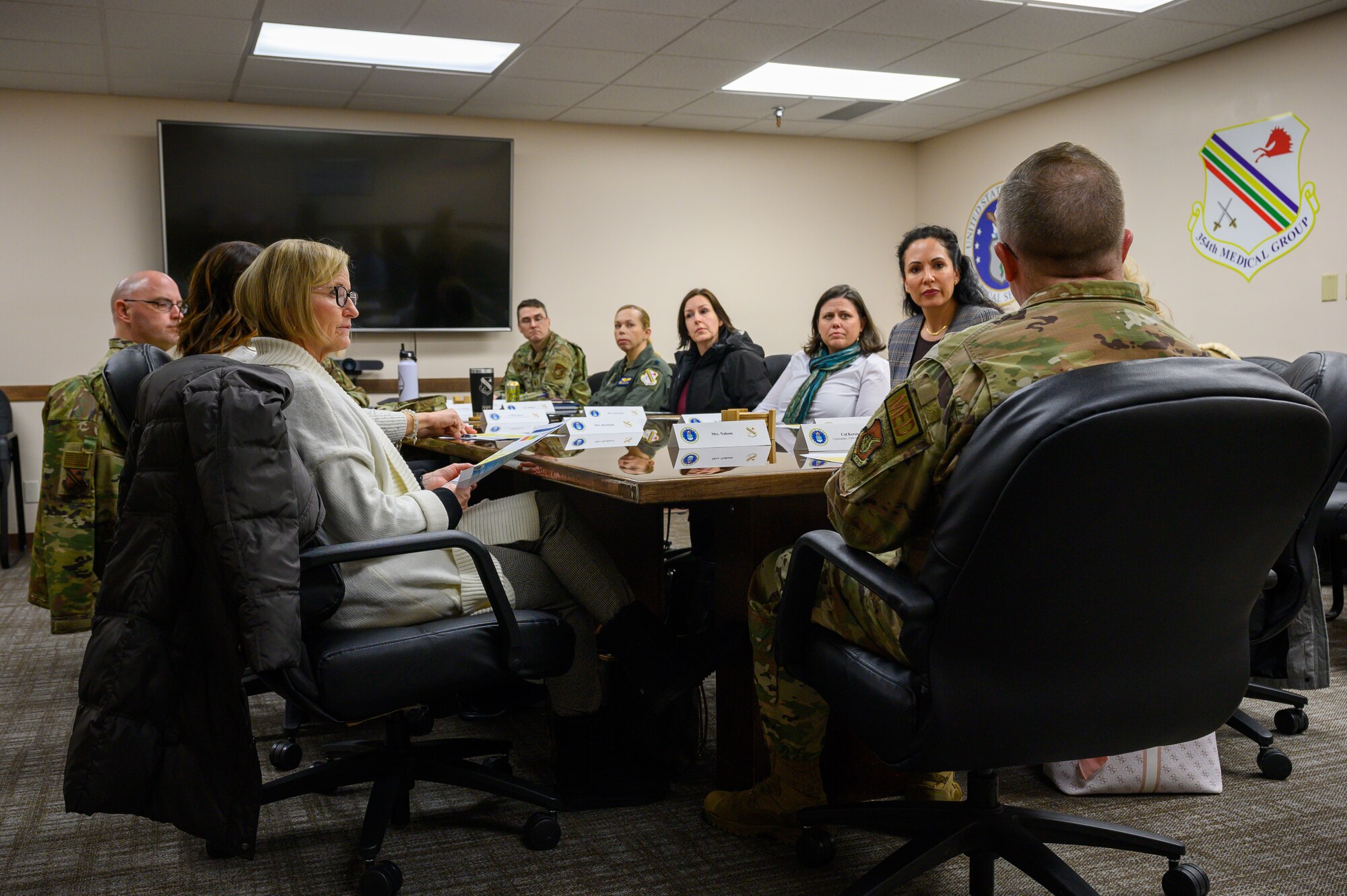 Leaders from the 354th Medical Group meet with the Pacific Air Forces, Eleventh Air Force and 354th Fighter Wing leadership spouses during a PACAF leadership visit to Eielson Air Force Base, Alaska, Jan. 4, 2023.