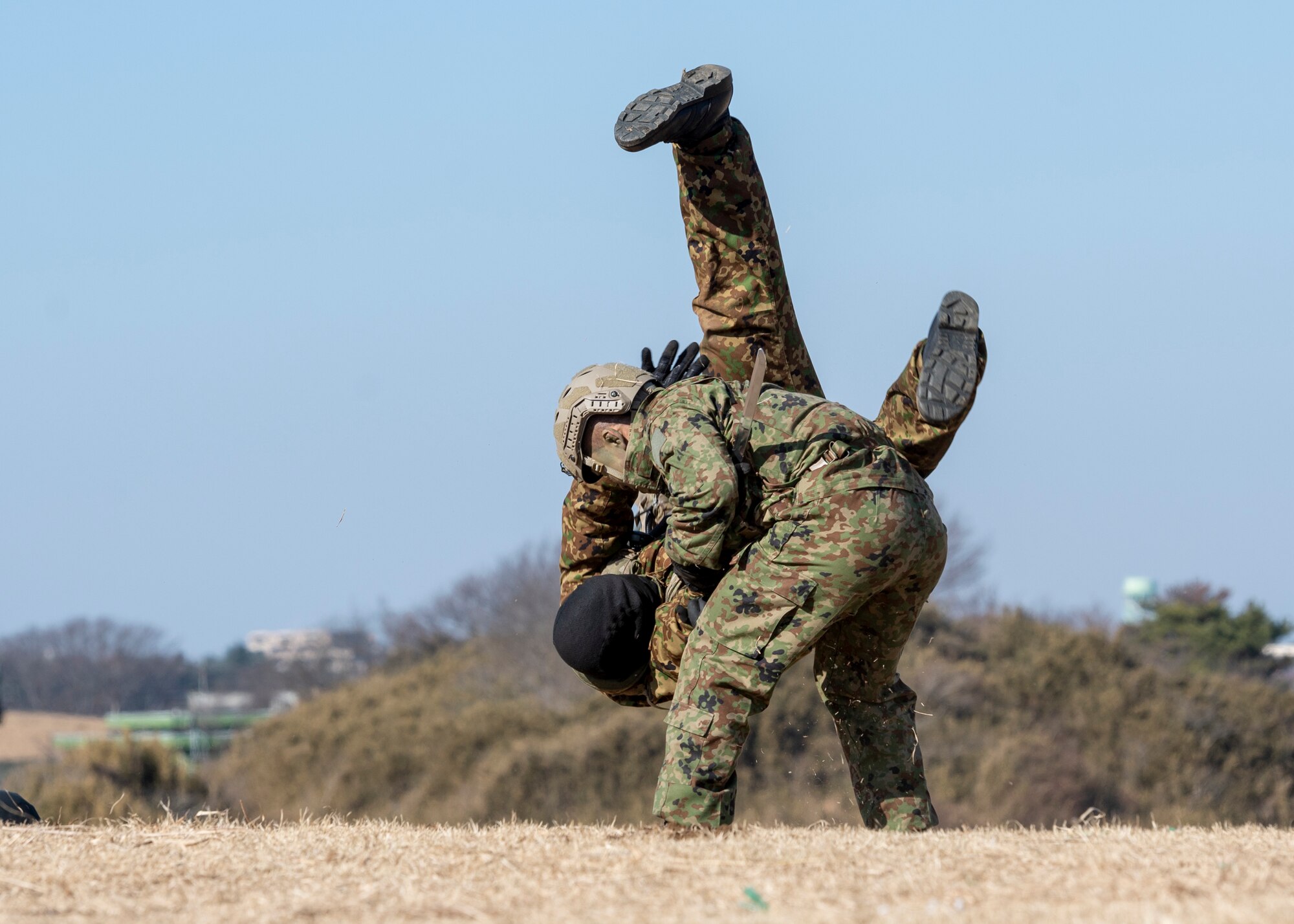 Two Japanese soldiers practice combat
