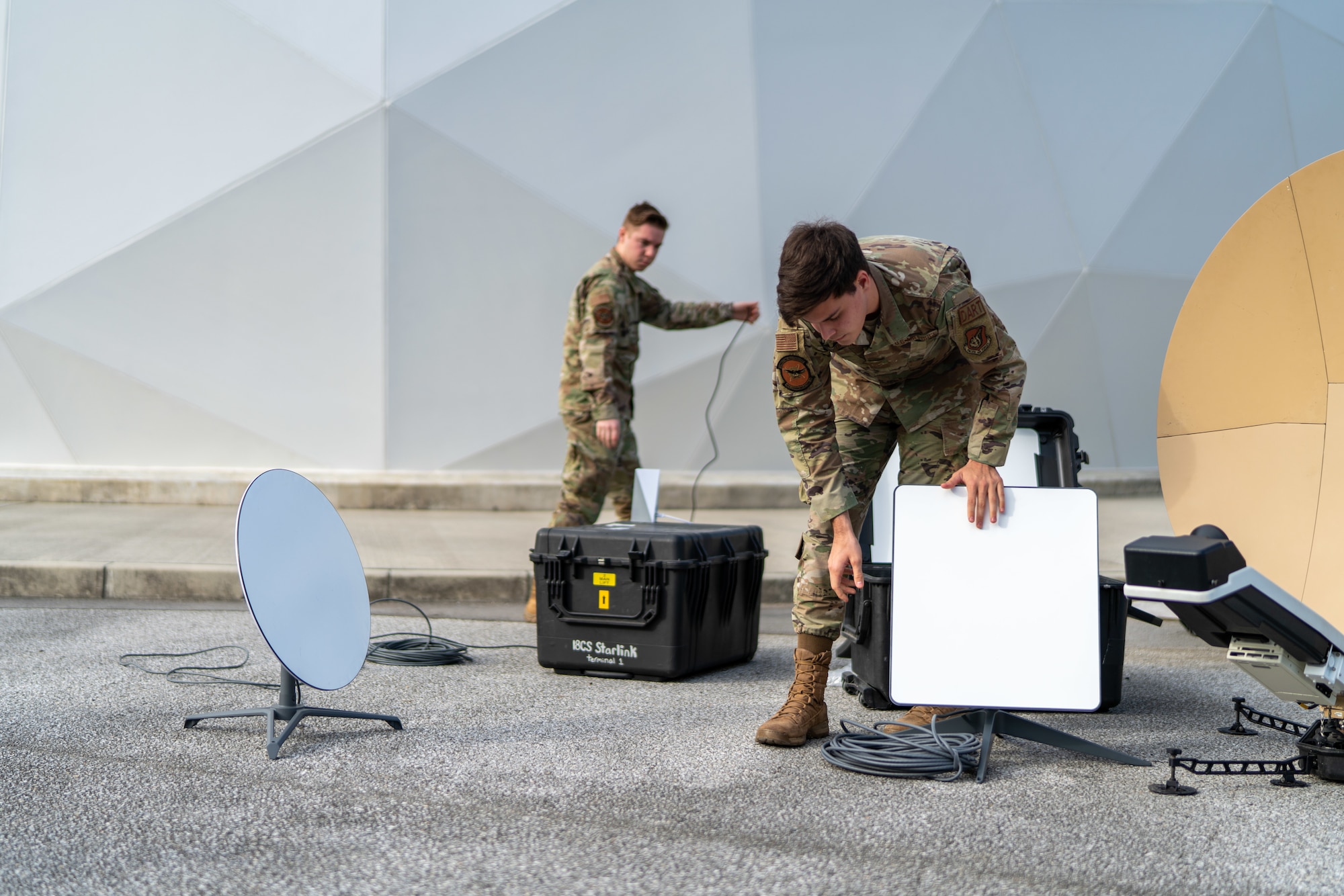 Airmen set up antennas.