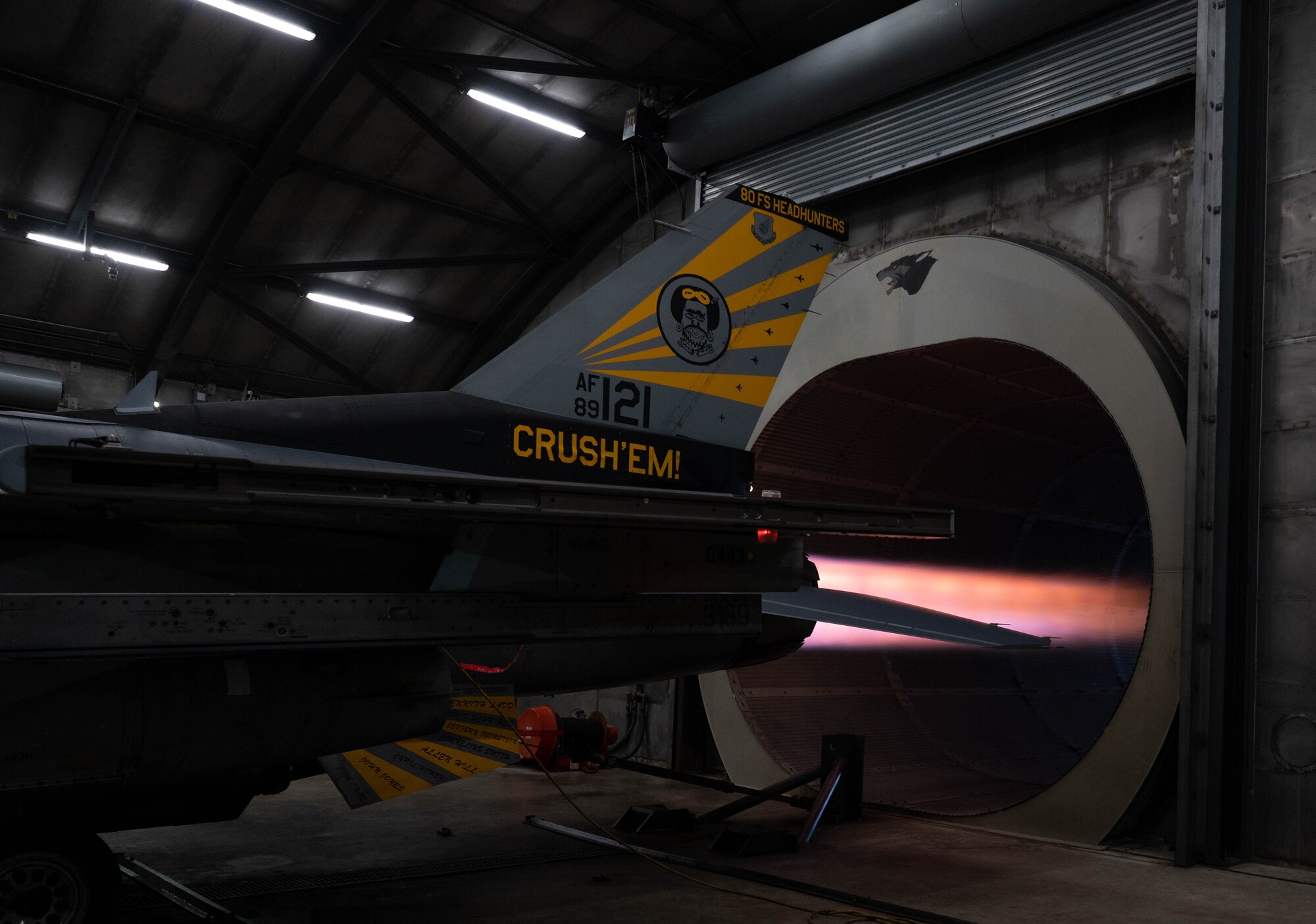 An F-16 Fighting Falcon engine fires inside the ‘Hush House’ at Kunsan Air Base, Republic of Korea, Jan. 9, 2023. Engines are tested to ensure that optimal combat readiness performance is ensured.  (U.S. Air Force Photo by Senior Airman Shannon Braaten)