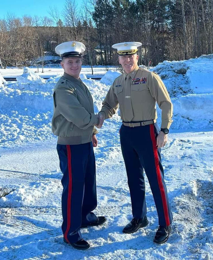 U.S. Marine Corps Col. Phillip Ash, commanding officer of the 1st Marine Corps District, greets Staff Sgt. Anthony Haley, a recruiter with Recruiting Sub-Station Augusta, Recruiting Station Boston, Jan. 11, 2023. Haley earned the title of Rookie Recruiter of the Year for fiscal year 2022, through his efforts in Presque Isle, Maine. (U.S. Marine Corps courtesy photo)