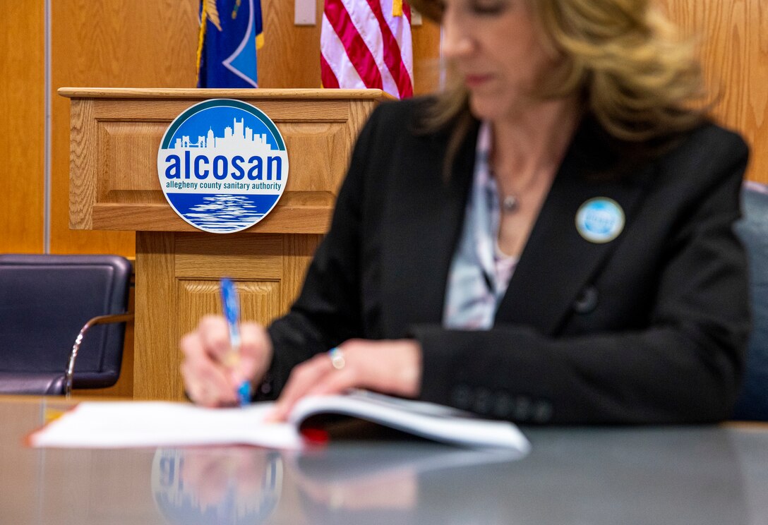 Ceremony signing for public partnership agreement.