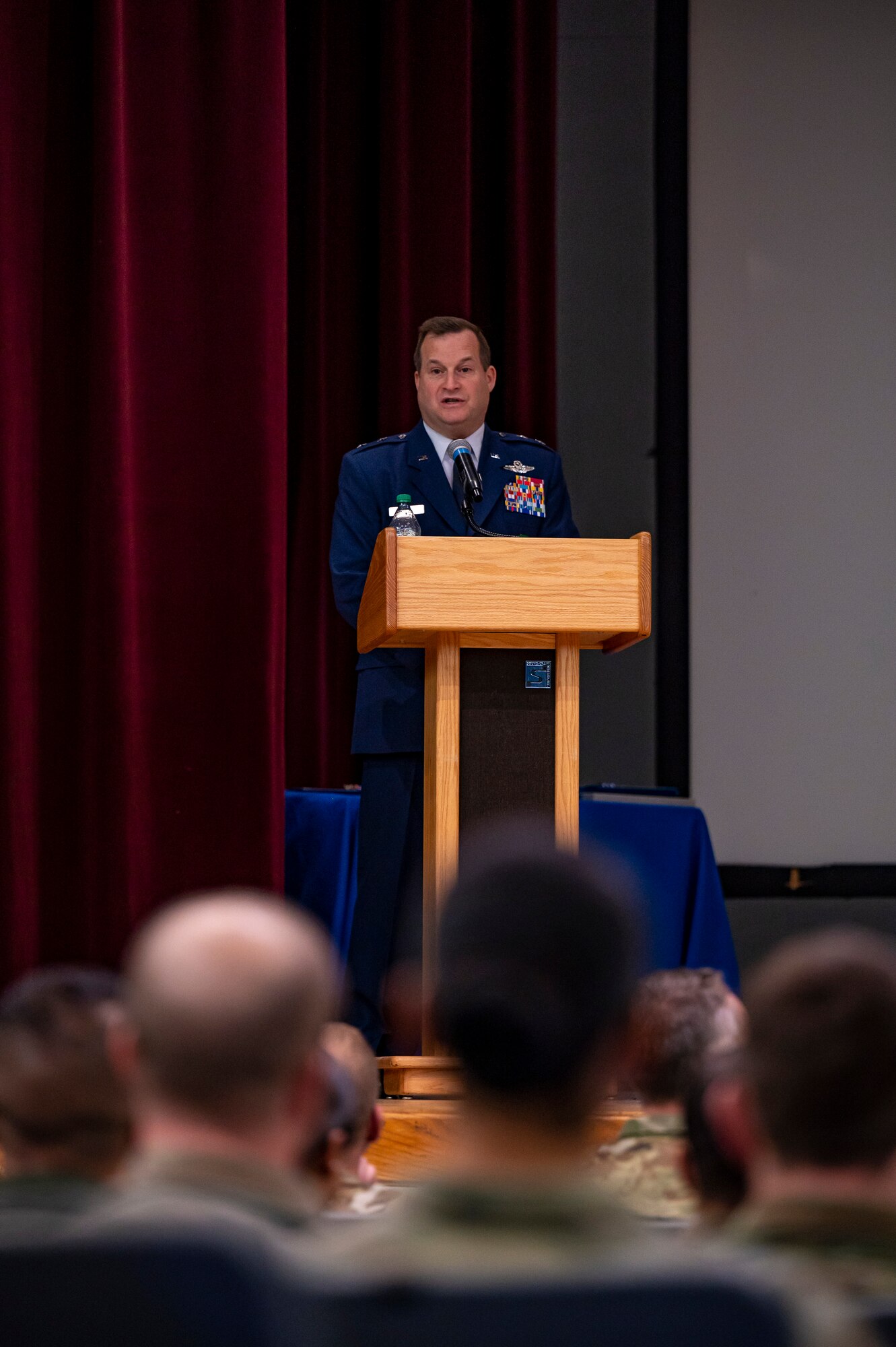 A man speaks on stage.