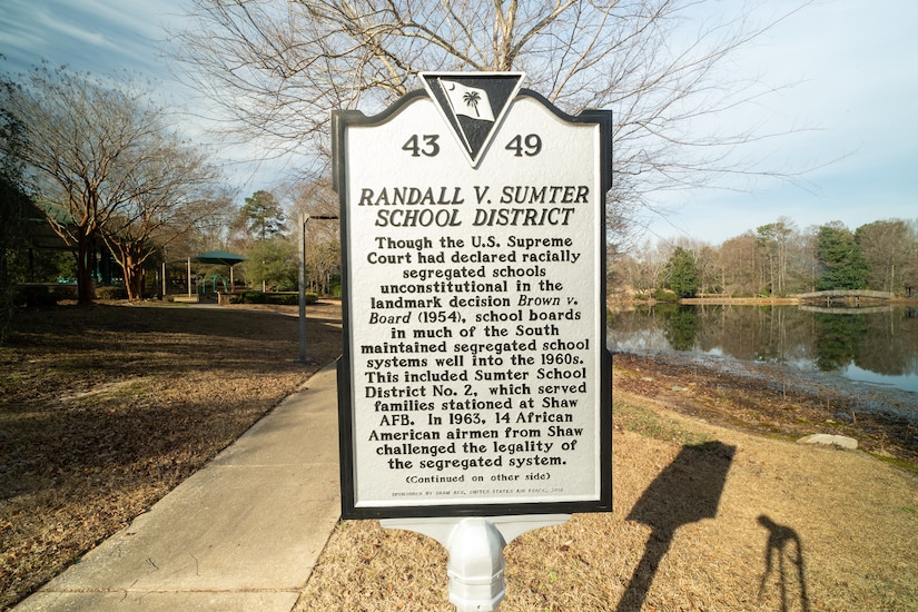 Historical state marker located at Memorial Lake on Shaw Air Force Base, South Carolina, is dedicated to the "Shaw 14," African American Airmen stationed at Shaw, who filed a lawsuit against the Sumter School District to end segregation.