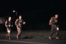 U.S. Service Members participate in the Norwegian Foot March, Marine Corps Base Hawaii, Dec. 21, 2022. The Norwegian Foot March originated as a test of marching endurance for soldiers in the Norwegian military in 1915, and today, aims to stimulate the general interest of marching over extended distances amongst military and civilian personnel. (U.S. Marine Corps photo by Cpl. Christian Tofteroo)