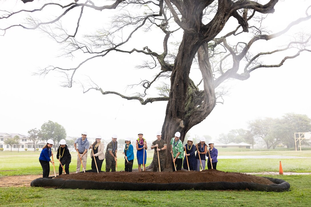 Marine Corps Base Hawaii leadership, Mokapu Elementary faculty and staff, and Hawaii representatives pose for a photo during the Mokapu Elementary groundbreaking ceremony, MCBH, Jan. 4, 2023. The renovation project will transform the existing campus and provide modern facilities designed to serve nearly 1,000 students. (U.S. Marine Corps photo by Cpl. Samantha Sanchez)