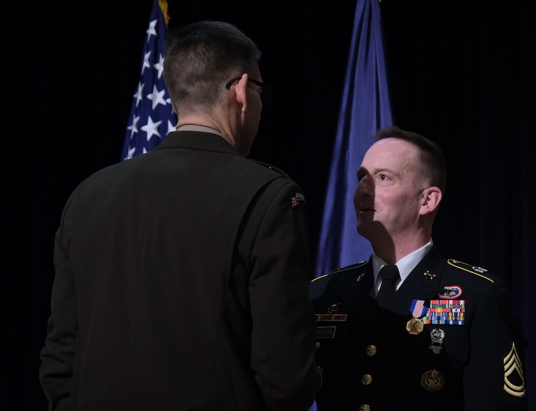 Arctic Angels stand at the end of a ceremony to present the Soldier's Medal to Army Sgt. 1st Class Andrew Chapoton, 11th Airborne Division, at Joint Base Elmendorf-Richardson, Alaska, Jan. 12.