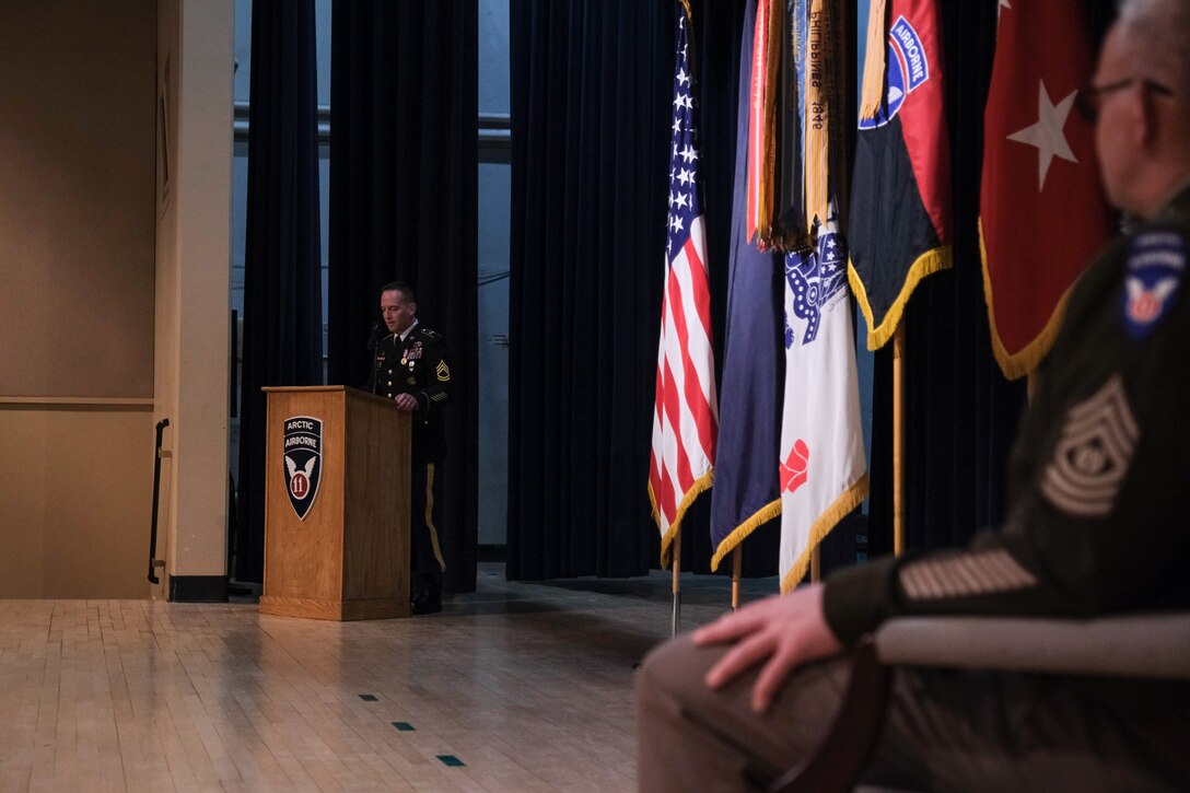 Arctic Angels stand at the end of a ceremony to present the Soldier's Medal to Army Sgt. 1st Class Andrew Chapoton, 11th Airborne Division, at Joint Base Elmendorf-Richardson, Alaska, Jan. 12.