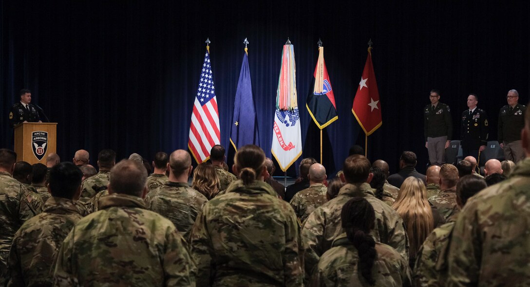 Arctic Angels stand at the end of a ceremony to present the Soldier's Medal to Army Sgt. 1st Class Andrew Chapoton, 11th Airborne Division, at Joint Base Elmendorf-Richardson, Alaska, Jan. 12.