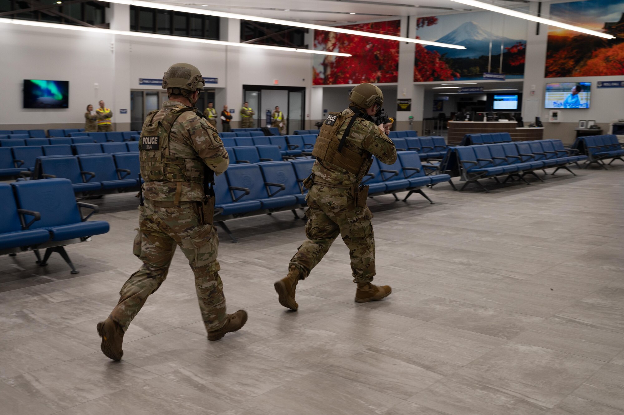 Two Security Forces Airman conduct a sweep