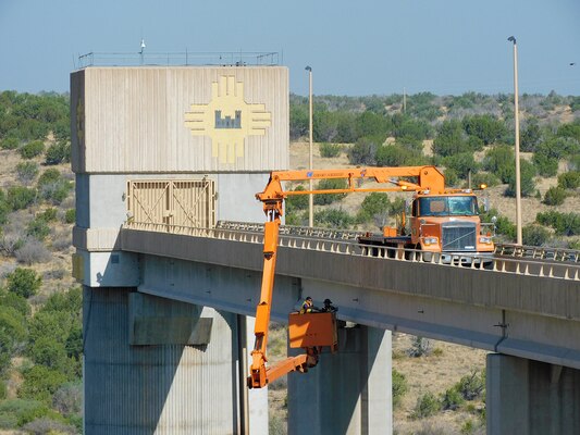 USACE-Albuquerque District employees inspect the bridge to the Santa Rosa Dam control tower using a contracted “Under-bridge Access Unit” during a routine 5-year periodic inspection, May 11, 2022. This crane, aka a “snooper crane,” was contracted from Duluth, Minnesota. Due to the very unique nature of the crane, there are only a few “rentable” vehicles of this type available in the U.S. and thus this contract action requires a long lead time.