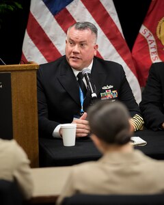 Force Master Chief Greg Carlson of Naval Surface Force Pacific answers a question during an enlisted roundtable at the Surface Navy Association’s 35th National Symposium in Arlington, Va., Jan. 10. Top enlisted leaders from the U.S. Navy and U.S. Coast Guard answered questions from audience members, in-person and virtual, regarding concerns affecting service members and their families; topics included pay and allowances, childcare support, and access to mental healthcare. The symposium brought together joint experts and decision-makers in the military, industry, and congress to discuss how the Surface Force is a critical element of national defense and security.