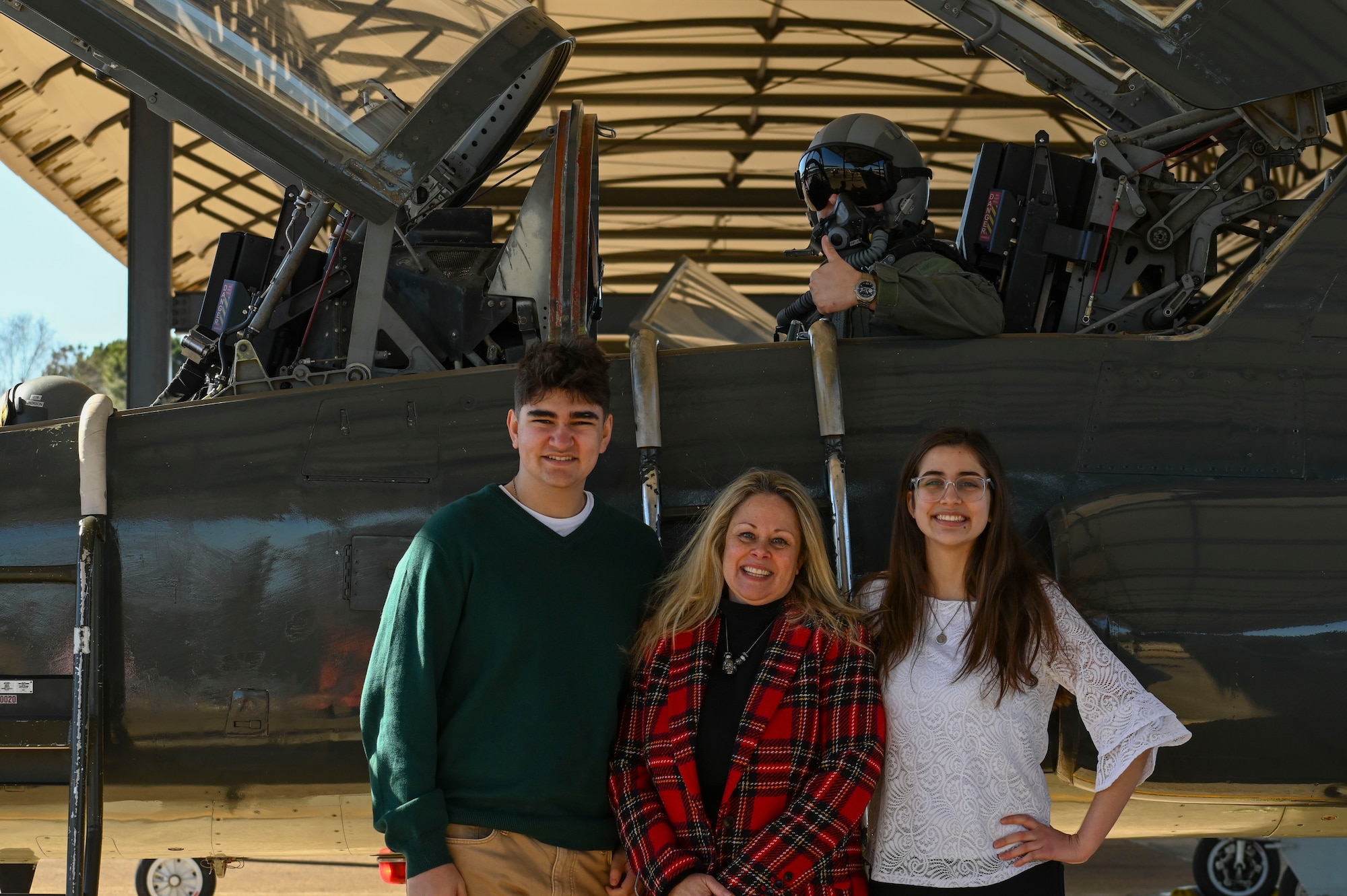 U.S. Air Force Tech Sergeant Joseph Cannada and the family of U.S. Air Force Maj David Brodeur, prepare for Cannadas incentive flight in the T-38 Talon, at Columbus Air Force Base, Miss. Jan. 5, 2023. In honor of a promise Brodeur made Cannada before his death, the 50th Flying Training Squadron fulfilled the promise of an incentive flight for Cannada. (U.S. Air Force photo by Senior Airman Jessica Haynie)