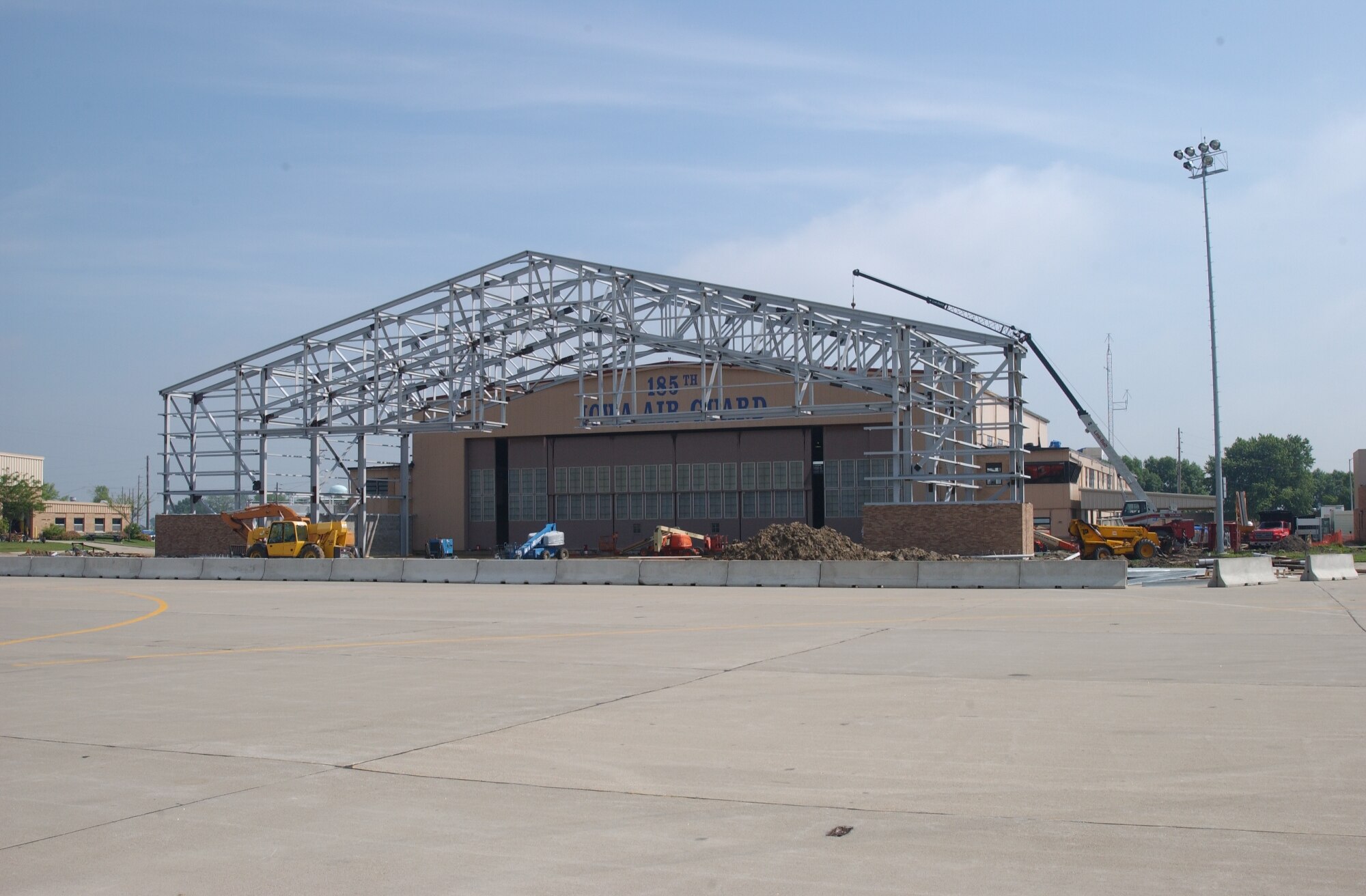 Construction of a large addition to the main hangar at the Iowa Air National Guard