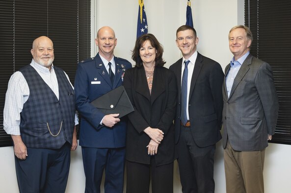From left to right: Chairman of Defense Mission Task Force Keith Klaehn, Col. David Hanson, Space Base Delta 1 commander, Colorado State Board of Land Commissioners President Christine Scanlan, Lt. Governor Chief of Staff Mark Honnen, and Colorado State Board of Land Commissioners Staff Director Bill Ryan gather for a photo during the Colorado State Land Board’s public board meeting in Denver Jan. 11, 2023.