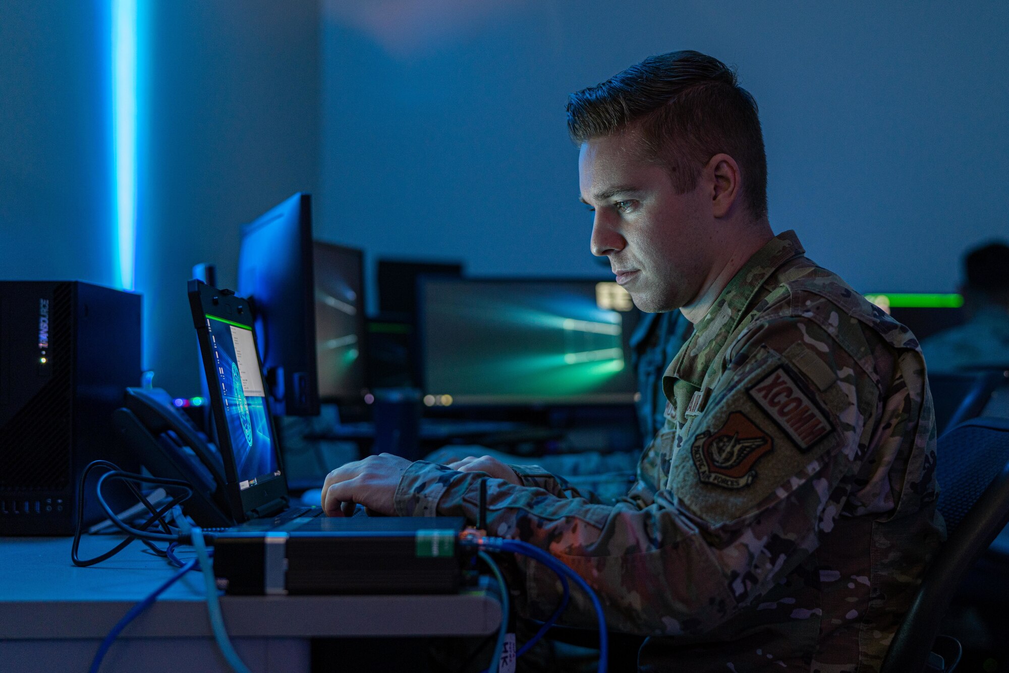 An Airman checks his internet connection.