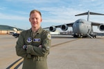 U.S. Air Force Maj. Kyle Wagner, a pilot assigned to the 167th Operations Group, poses for a photo in front of a C-17 Globemaster III aircraft at the 167th Airlift Wing, Martinsburg, West Virginia, Jan. 08, 2023