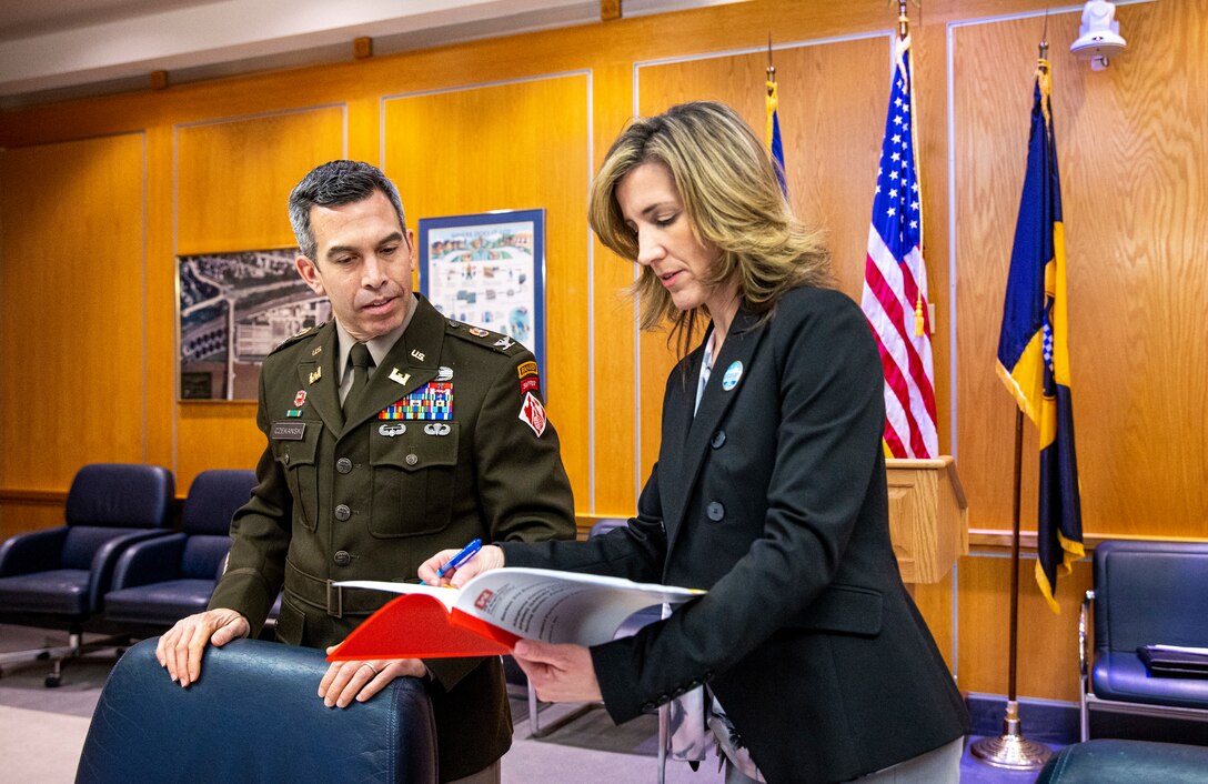 Ceremony signing for public partnership agreement.