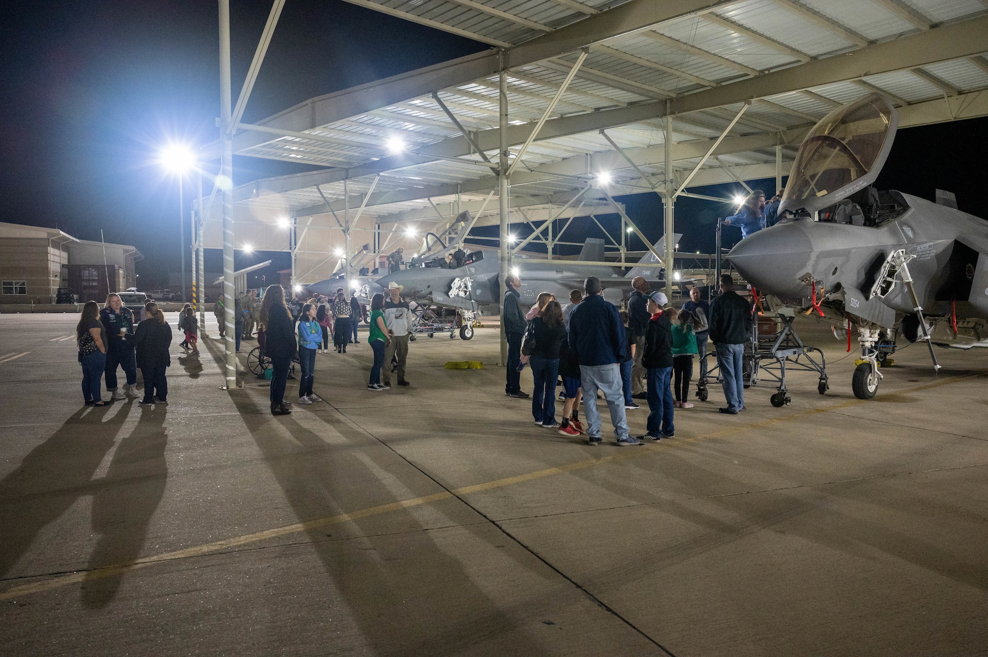 Members of a local Girl Scouts troop view F-35A Lightning II aircraft assigned to the 62nd Fighter Squadron Jan.11, 2022, at Luke Air Force Base, Arizona.