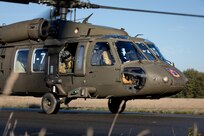 A U.S. Army UH-60 Black Hawk helicopter from 1-214th General Support Aviation Battalion,12th Combat Aviation Brigade, taxis along the flight line after refueling during exercise Falcon Autumn 22 at Vredepeel, Netherlands, Nov. 5, 2022. 12 CAB is among other units assigned to V Corps, America's Forward Deployed Corps in Europe. They work alongside NATO Allies and regional security partners to provide combat-ready forces, execute joint and multinational training exercises, and retain command and control for all rotational and assigned units in the European Theater. (U.S. Army photo by Staff Sgt. Thomas Mort)