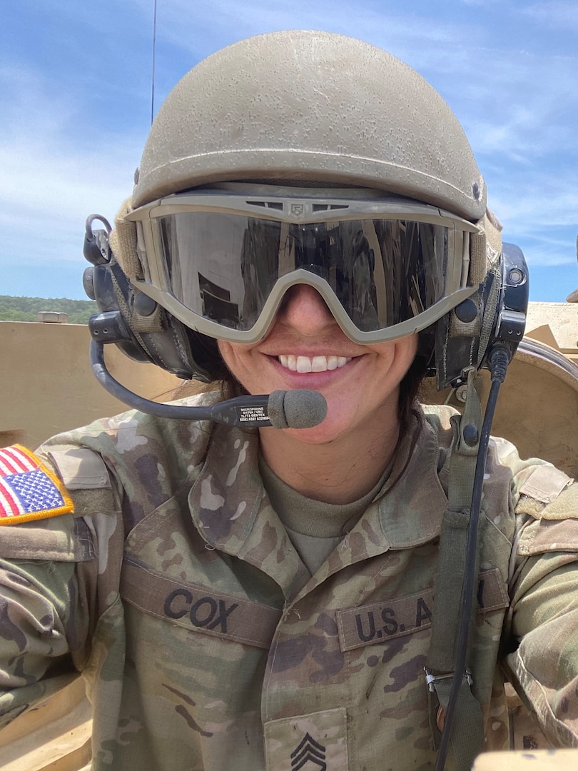 Staff Sgt. Elizabeth Cox, an armored crewman with the Texas Army National Guard’s 3rd Squadron, 278th Armored Cavalry Regiment, poses for a photo on her M1 Abrams Tank. Cox recently became the first female in the ARNG to graduate from the Abrams Master Gunner school, an advanced gunnery and maintenance school that earns graduates the designation of Abrams Master Gunner.
