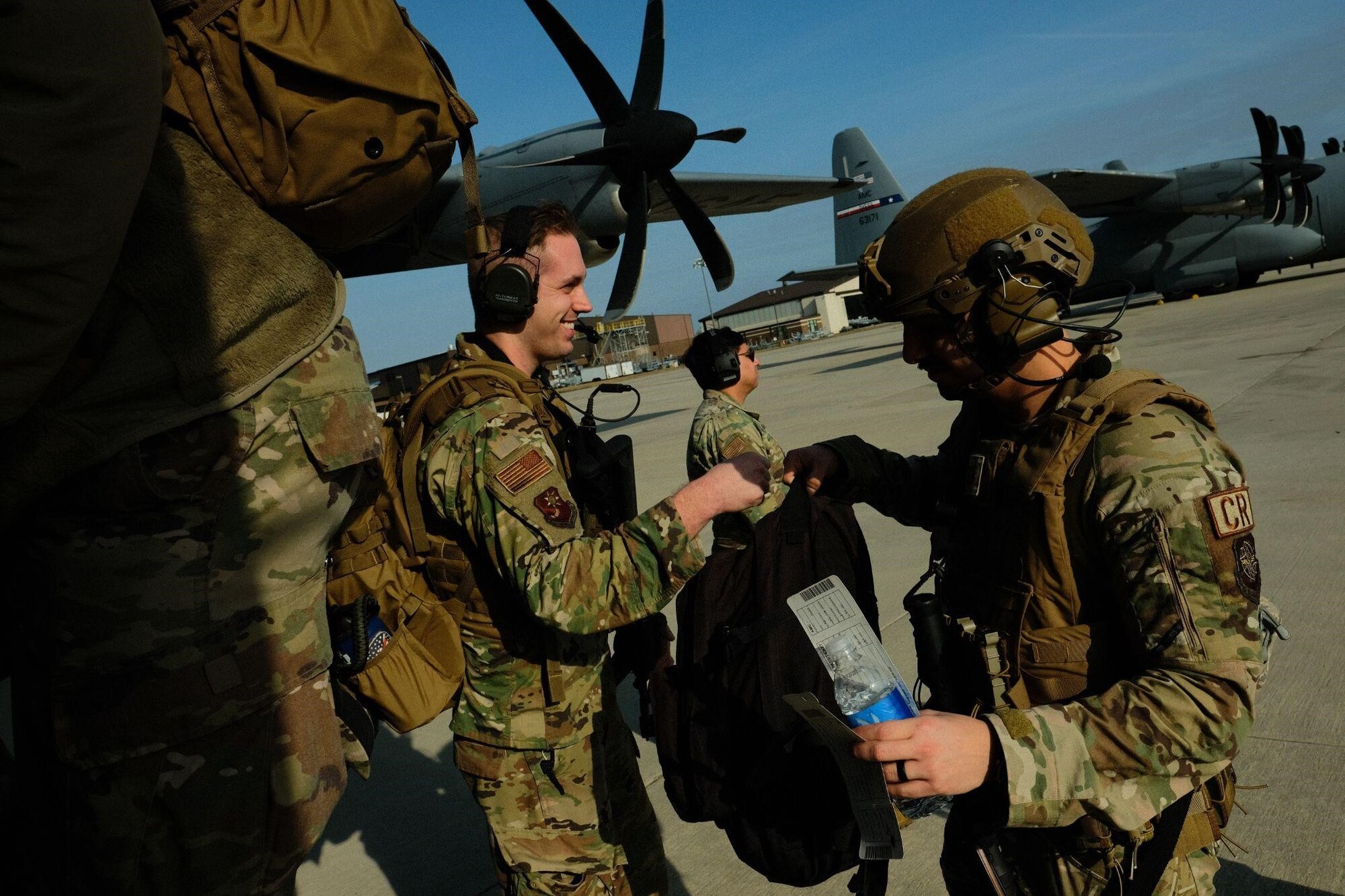 U.S. Air Force Airmen assigned to the 621st Contingency Response Wing board a C-130 Hercules as part of exercise Jersey Devil on Joint Base McGuire-Dix-Lakehurst, N.J., Jan. 11, 2023. Jersey Devil 23, a U.S. Air Force mobility exercise hosted by the 621st CRW, tests the abilities of multi-capable airmen to rapidly deploy, establish and control airbases alongside joint allies and partners. (U.S. Air Force photo by Senior Airman Joseph Morales)