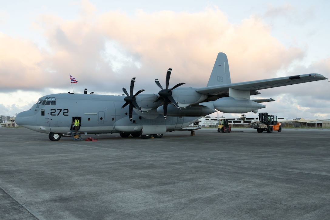 A U.S. Marine Corps KC-130J aircraft assigned to Marine Aerial Refueler Transport Squadron 153 is unloaded upon arriving at Marine Corps Air Station Kaneohe Bay, Marine Corps Base Hawaii, Jan. 6, 2023. VMGR-153 will formally activate as a KC-130 squadron of Marine Aircraft Group 24, 1st Marine Aircraft Wing, on Jan. 13, 2023. (U.S. Marine Corps photo by Cpl. Chandler Stacy)
