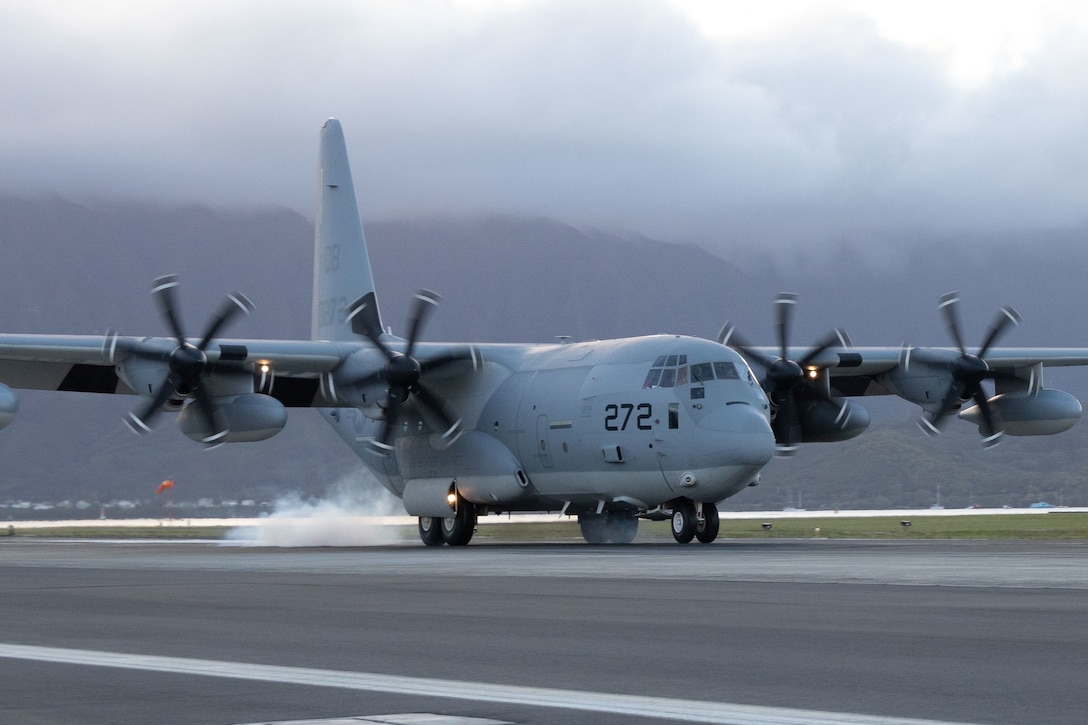 A U.S. Marine Corps KC-130J aircraft assigned to Marine Aerial Refueler Transport Squadron 153 lands on Marine Corps Air Station Kaneohe Bay, Marine Corps Base Hawaii, Jan. 6, 2023. Jan. 6, 2023. VMGR-153 will formally activate as a KC-130 squadron of Marine Aircraft Group 24, 1st Marine Aircraft Wing, on Jan. 13, 2023. (U.S. Marine Corps photo by Cpl. Chandler Stacy)
