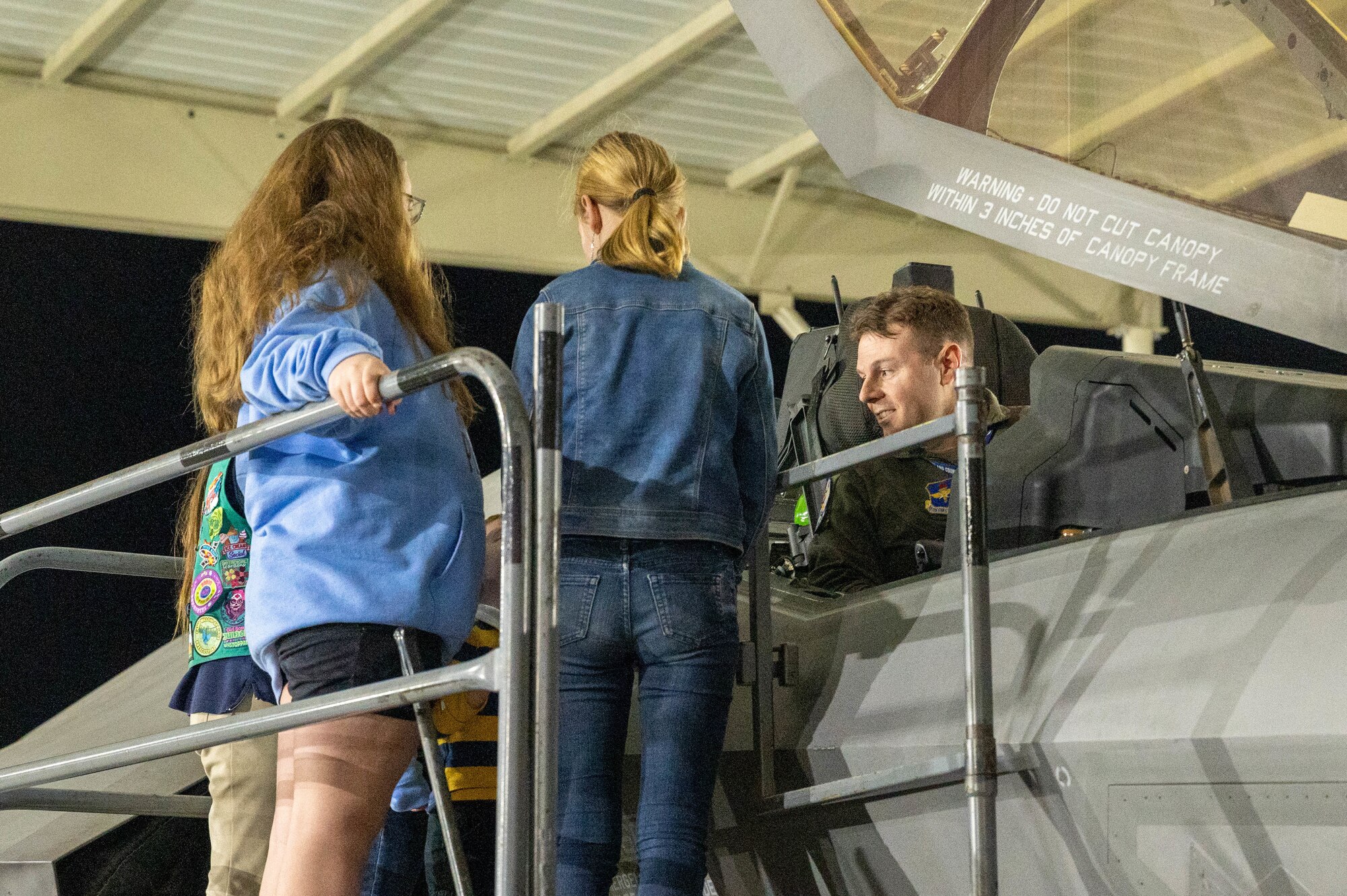 U.S. Air Force Lt. Col. Tyler Smith, 62nd Fighter Squadron commander, gives a tour of an F-35A Lightning II aircraft to a local Girl Scouts troop Jan. 11, 2023, at Luke Air Force Base, Arizona.