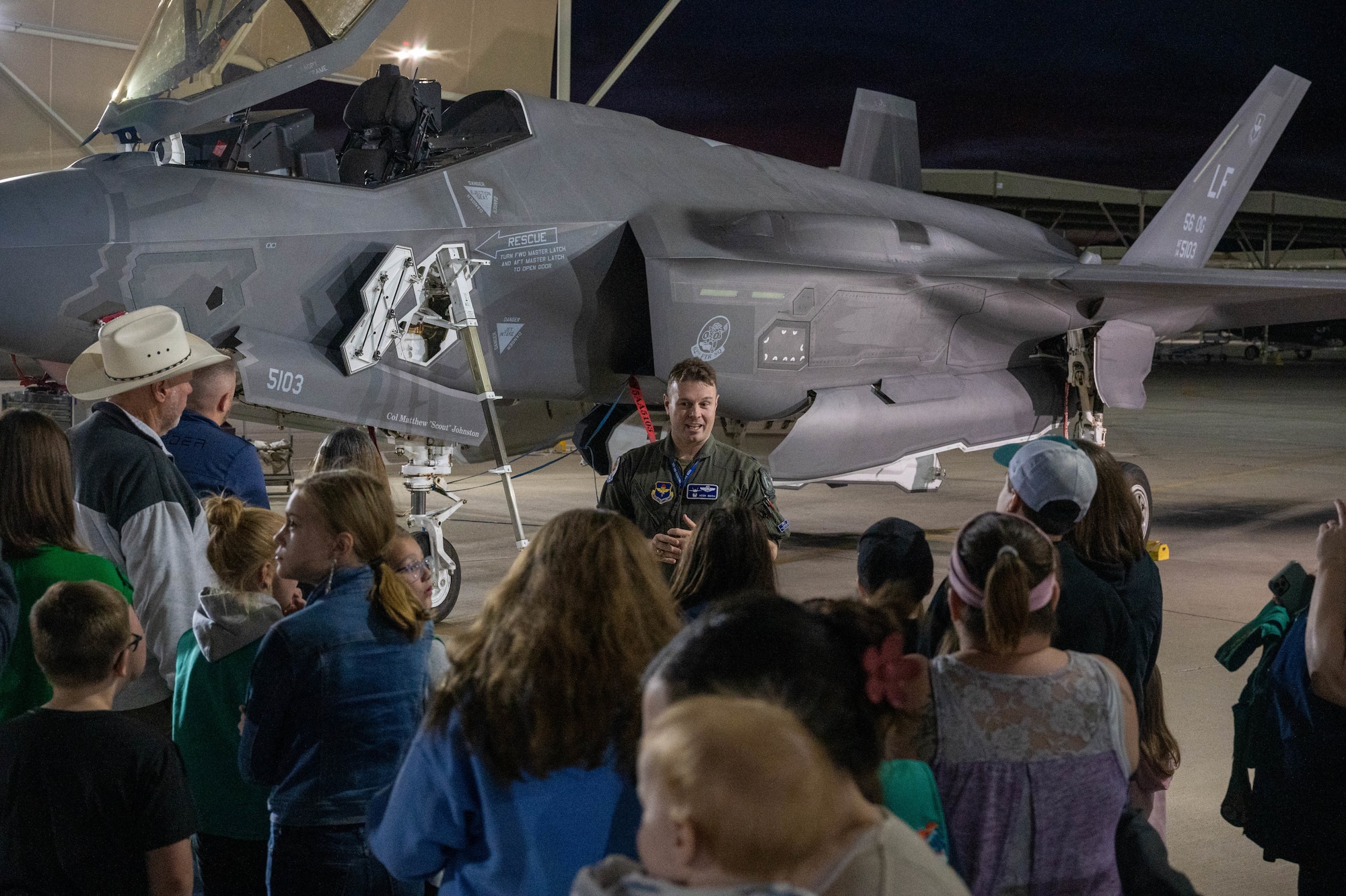 U.S. Air Force Lt. Col. Tyler Smith, 62nd Fighter Squadron commander, gives a tour of an F-35A Lightning II aircraft to a local Girl Scouts troop Jan. 11, 2023, at Luke Air Force Base, Arizona.