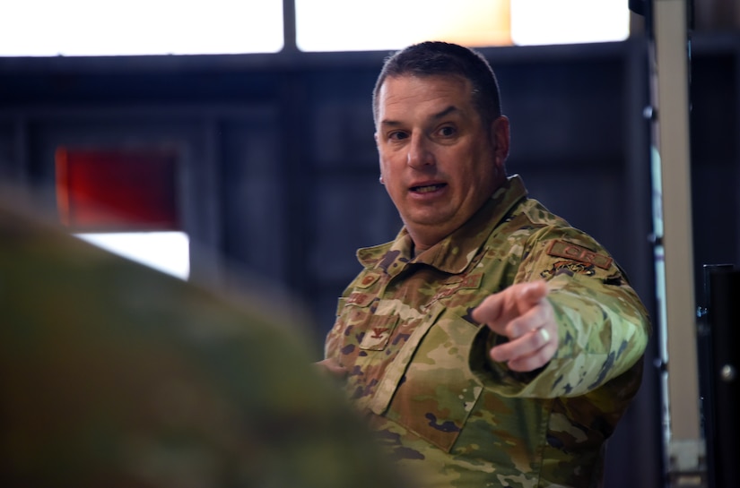 U.S. Air Force Col. Daniel Mollis, 621st Contingency Response Group commander, briefs airmen about the Jersey Devil 23 exercise.