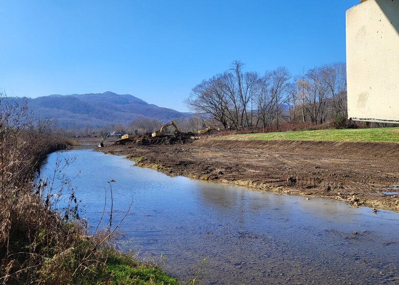 The Middlesboro channel located in Middlesboro, Kentucky, consistently fills with sedimentation and vegetation which restrict flow capacity. Clearing the channel will restore flow capacity to the channel and reduce the risk of flooding for the community. USACE Photo
