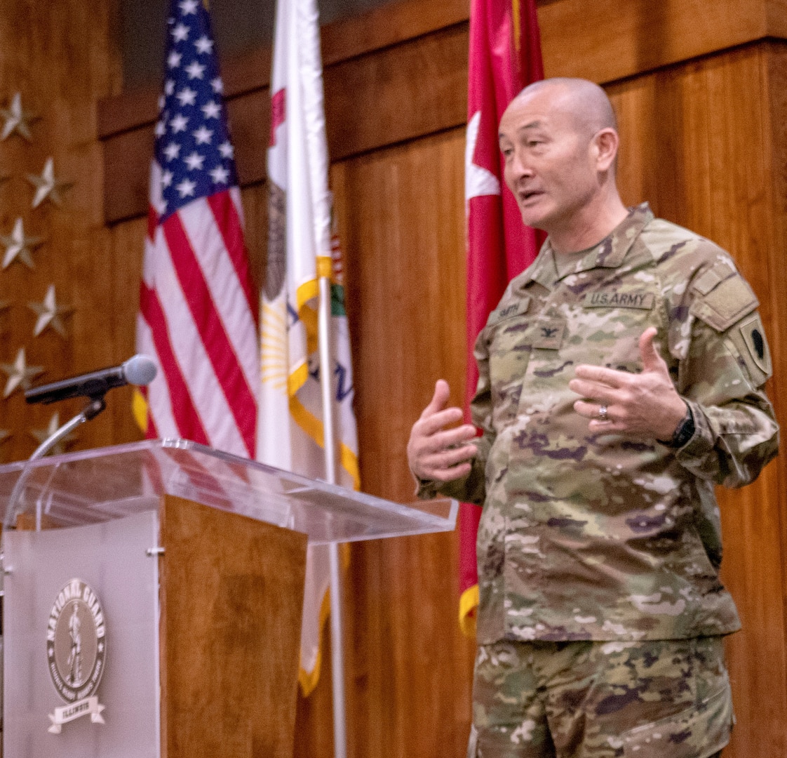 Newly promoted Col. Eric Smith, Director of Logistics for the Illinois Army National Guard, thanks family and friends for their support throughout his 34 years of service during a promotion ceremony Jan. 13 at Camp Lincoln, Springfield.