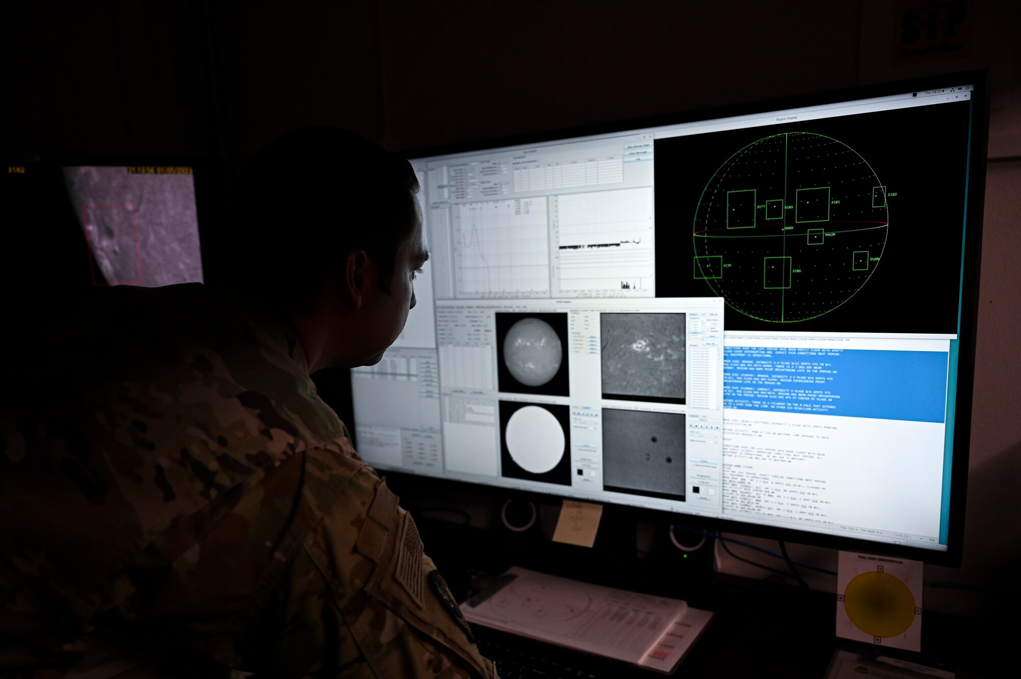 U.S. Air Force Tech. Sgt. Sergio Martinez, 2nd Weather Squadron radar airfield and weather systems noncommissioned officer in charge, reviews data collected from examining the sun at Holloman Air Force Base, New Mexico, Jan. 6, 2023. Tracing the sun's solar activity allows the squadron to consistently output the latest information on the likelihood of solar interference.  (U.S. Air Force photo by Airman 1st Class Isaiah Pedrazzini)