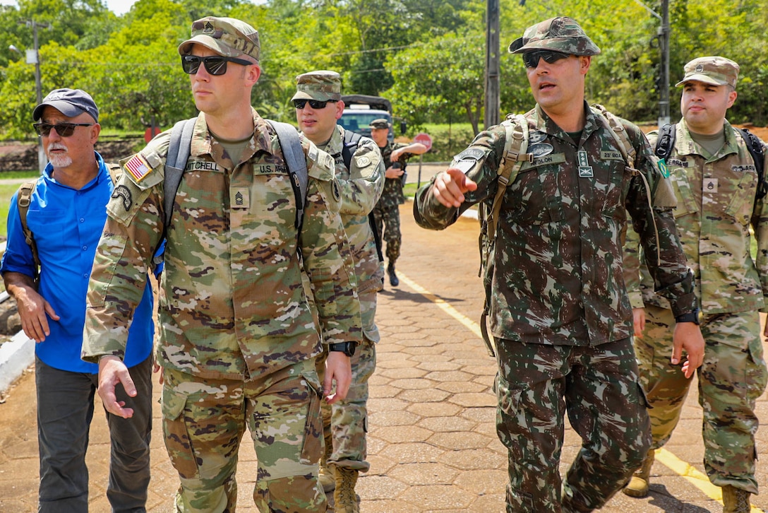 During the initial planning conference for exercise Southern Vanguard 24 in Macapa, Brazil, Dec 5-8, 2022, Master Sgt. Rob Mitchell and a Brazilian army infantry officer discuss training scenarios, logistical requirements and training objectives for the bilateral event scheduled in the fall of 2023. Southern Vanguard is a U.S. Southern Command-sponsored, U.S. Army South-conducted exercise at the operational and tactical levels to increase interoperability between U.S. and Western Hemisphere forces.