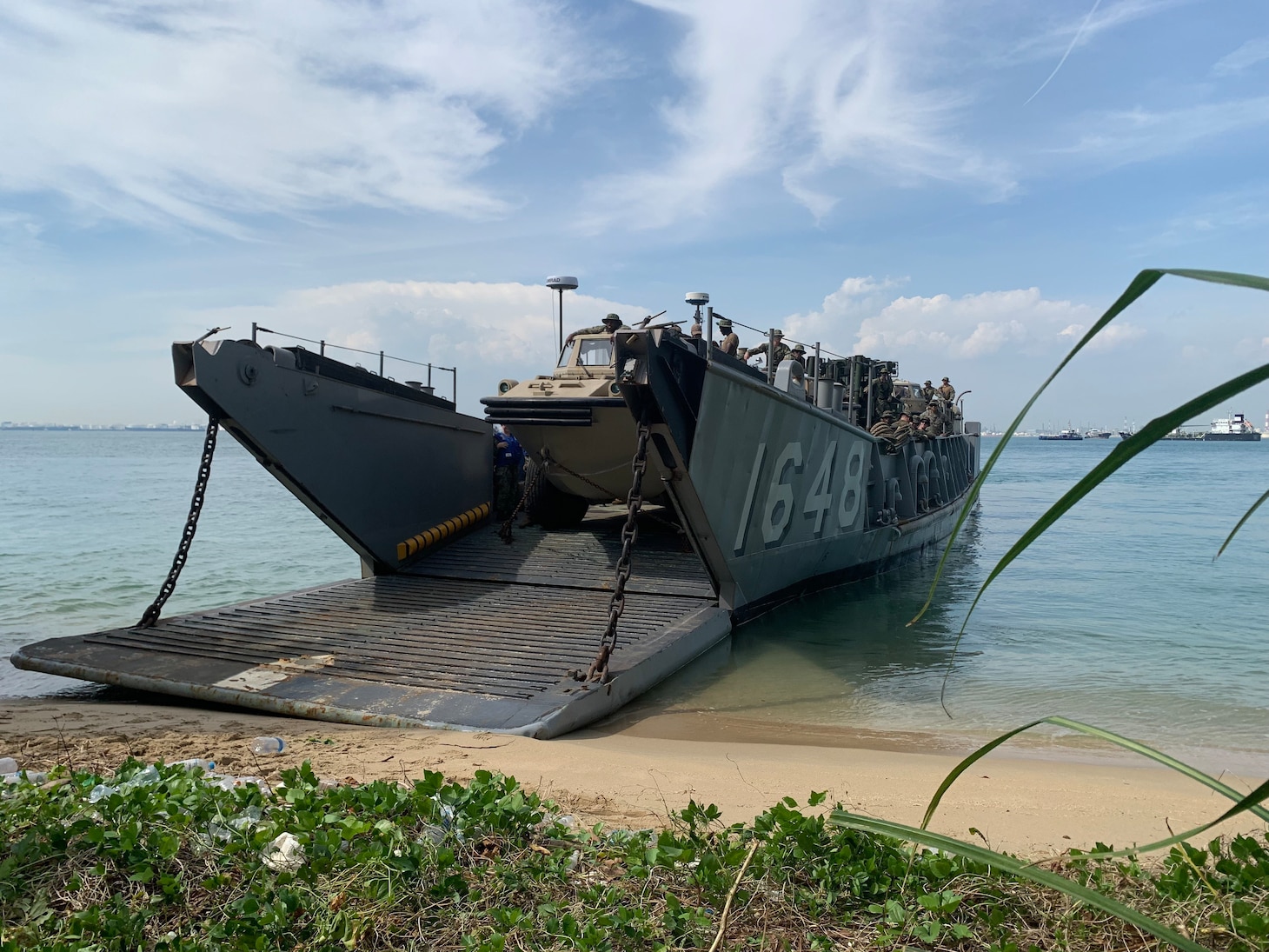 Landing Craft, Utility (LCU) 1648, assigned to Assault Craft Unit 1, launched from USS John P. Murtha (LPD 26) conducts ship-to-shore exercise on Pulau Sudong as part of Cooperation Afloat Readiness and Training/Marine Exercise Singapore, Jan. 12. CARAT/MAREX Singapore is a bilateral exercise between Singapore and the United States designed to promote regional security cooperation, maintain and strengthen maritime partnerships, and enhance maritime cooperation. In its 28th year, the CARAT series is comprised of multinational exercises, designed to enhance U.S. and partner navies’ abilities to operate together in response to traditional and non-traditional maritime security challenges in the Indo-Pacific region.