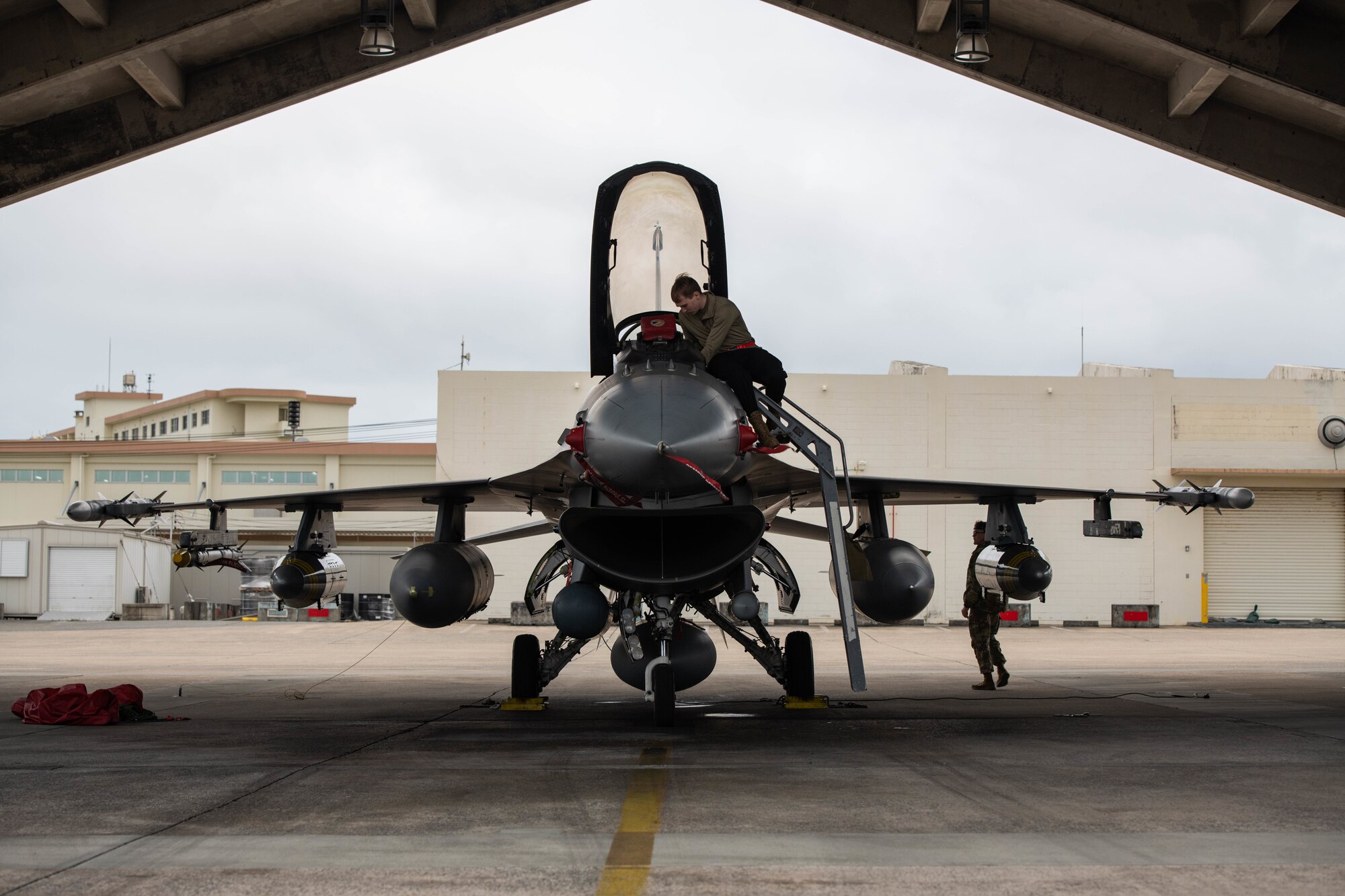 An Airman performs maintenance on an aircraft.