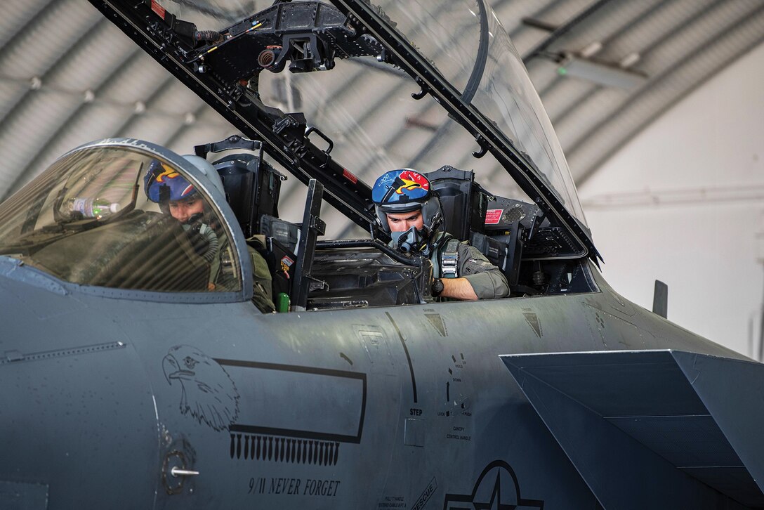 Air Force aircrew perform preflight checks before forward deploying to Łask Air Base, Poland