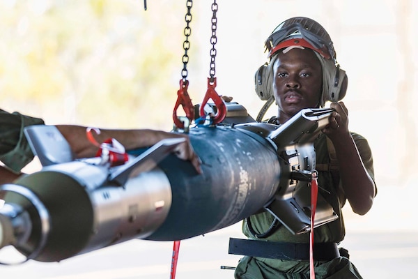 Marine Corps Lance Corporal Munachimso Metu, aviation ordnance technician with Marine Fighter Attack Squadron 242, prepares ordnance at Royal Australian Air Force Base Tindal,
Australia, August 12, 2022 (U.S. Marine Corps/Jackson Ricker)