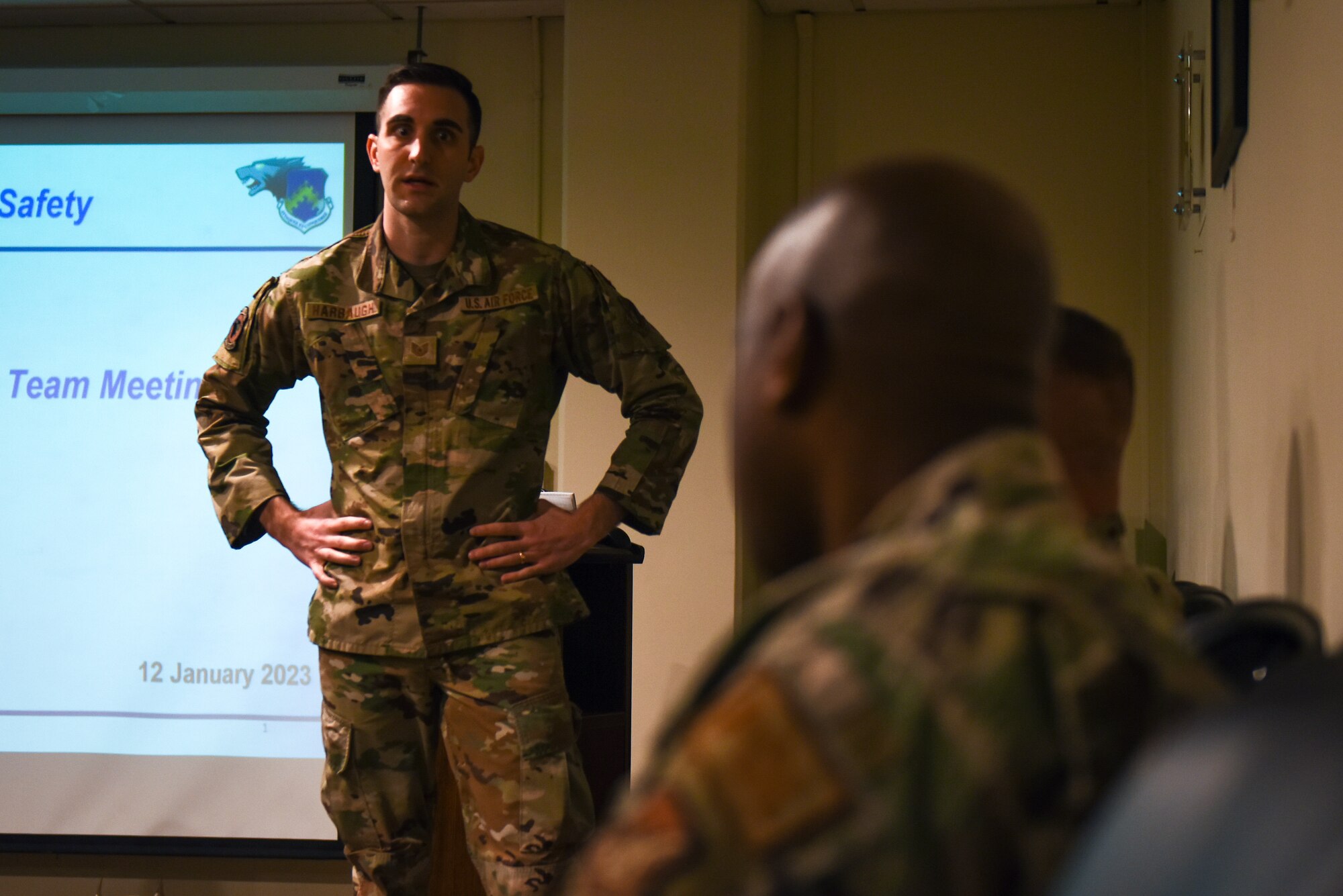 Tech. Sgt. David Harbaugh, 8th Fighter Wing occupational safety manager, answers a question during a safety briefing on Kunsan Air Base, Republic of Korea, Jan. 12, 2023. Harbaugh served as a security forces defender at Malmstrom Air Force Base, Mont., before cross training into safety. (U.S. Air Force photo by Tech. Sgt. Timothy Dischinat).